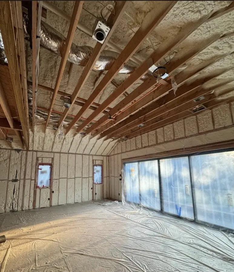 Interior walls and ceiling insulated with spray foam during new construction in Jessup